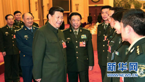 　　2013年3月11日，习近平出席十二届全国人大一次会议解放军代表团全体会议并发表重要讲话。新华社记者 李刚摄
